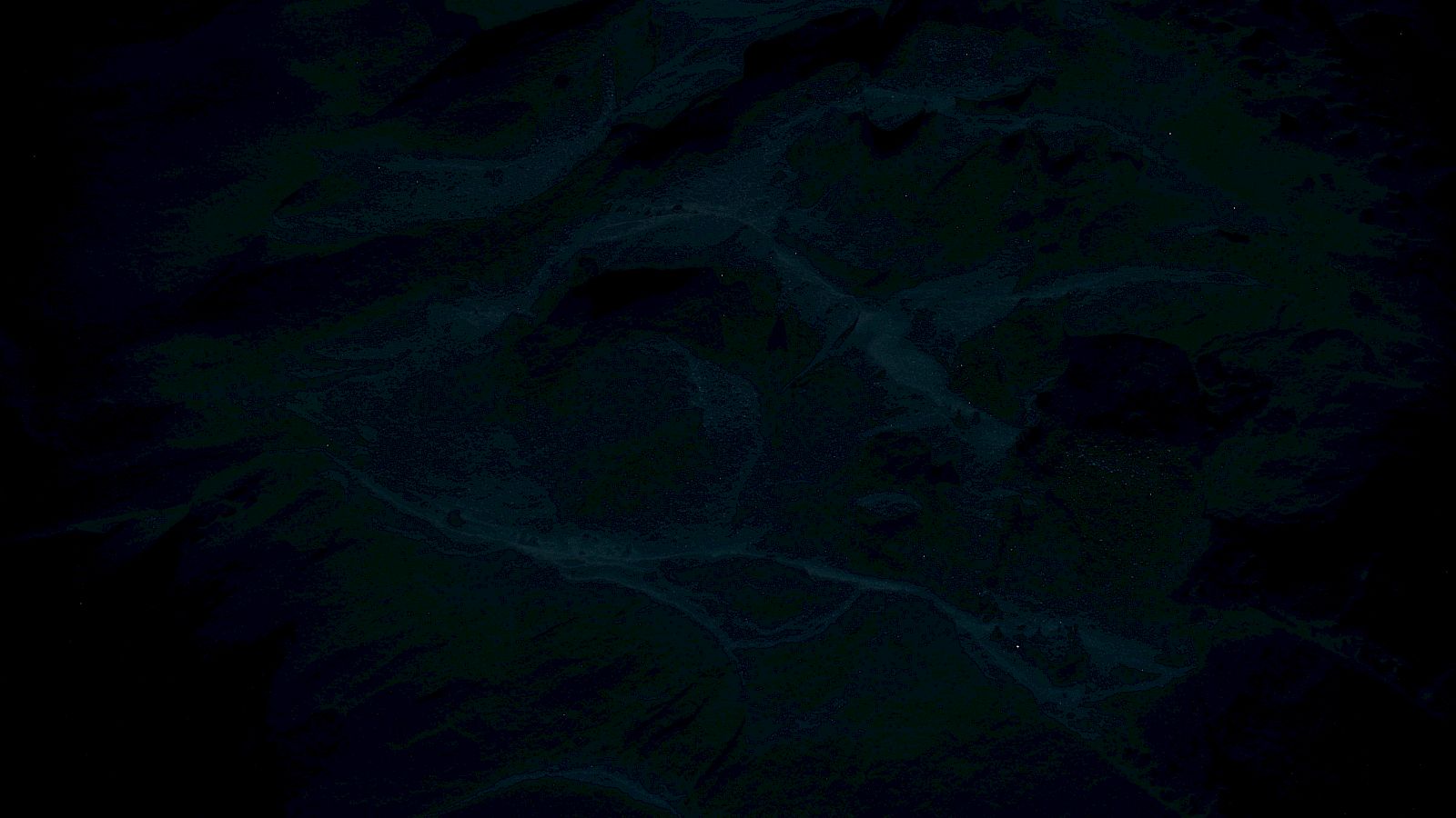 The image is very dark and unclear, making it difficult to identify any specific objects or details.