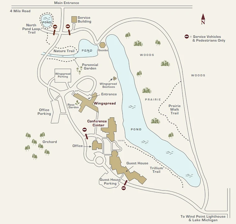This image is a map showing paths, buildings, ponds, and trails in a landscaped area, including a visitor center and parking sections.